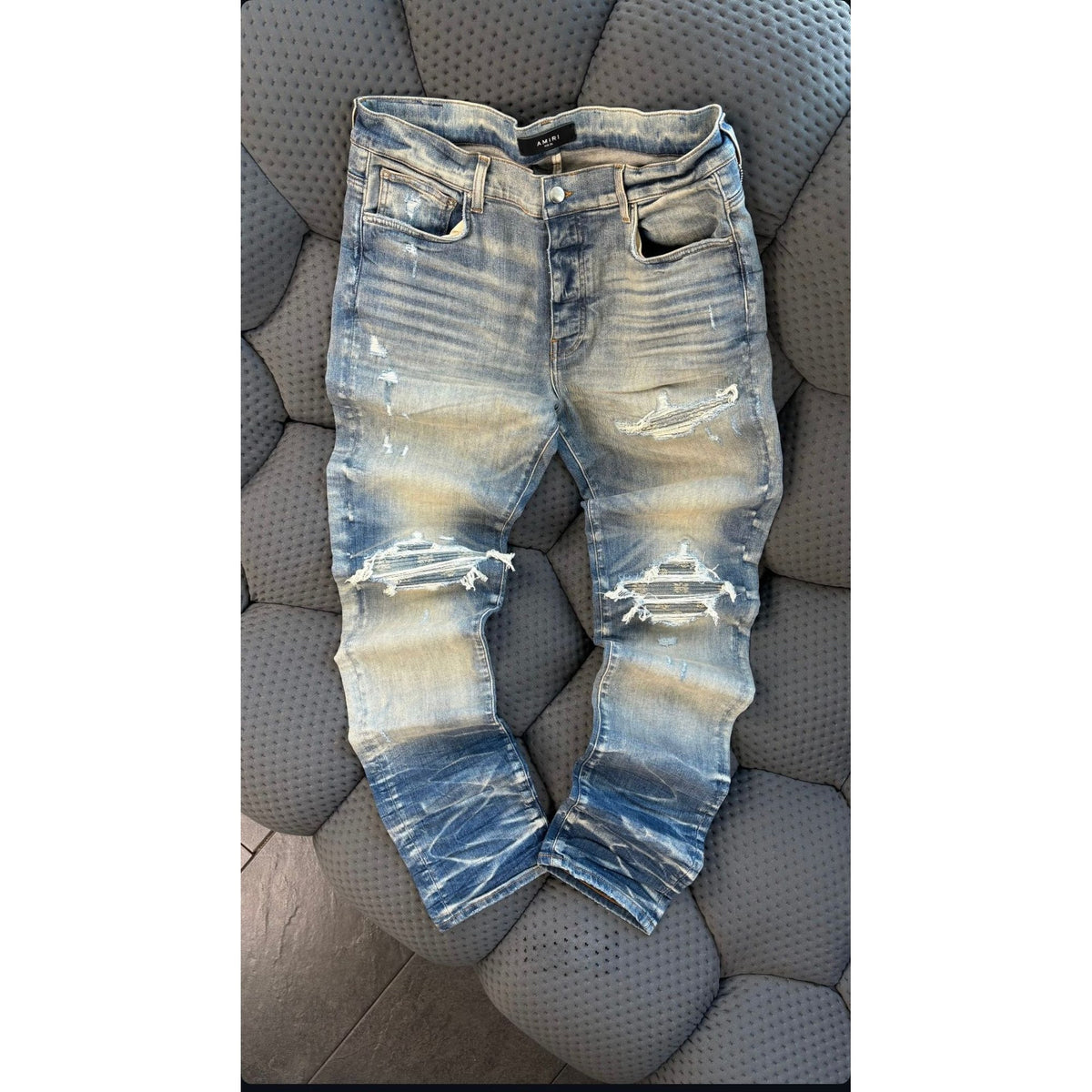 Amiri Ripped Knee Skinny Jeans - Medium Blue Wash